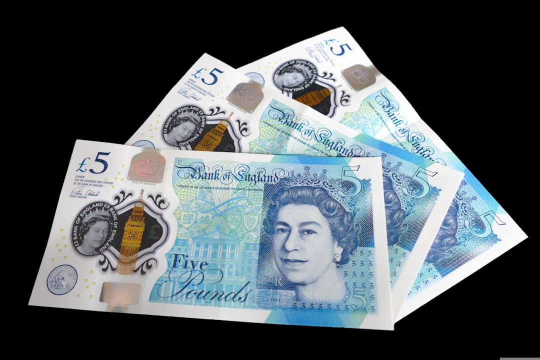 Three british 5 pound bank notes on a black background. Small donations can be made on my profile page. Thanks for visiting, hope my work is useful to you : )